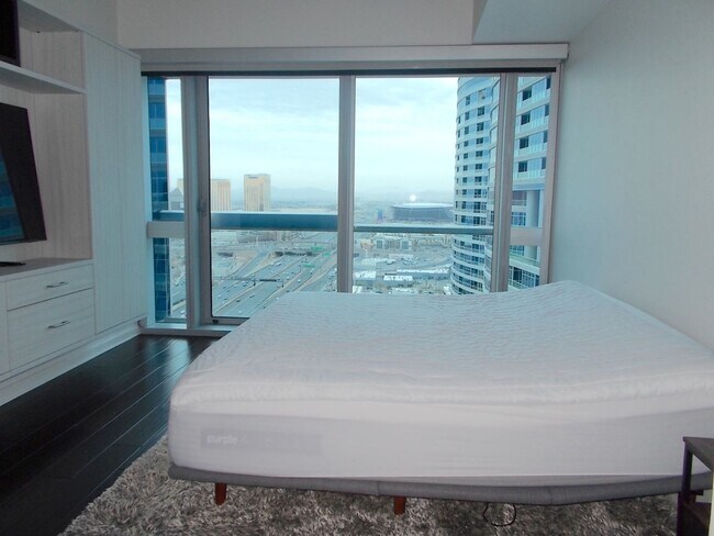 Building Photo - Experience elevated high-rise living at The Martin.