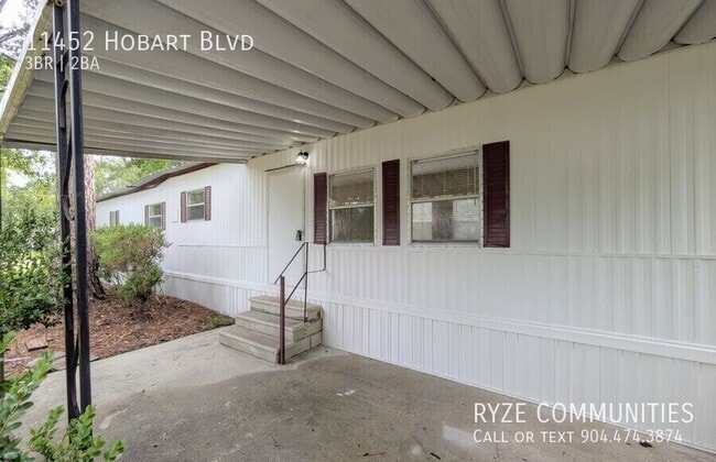 Building Photo - 11452 Hobart Blvd