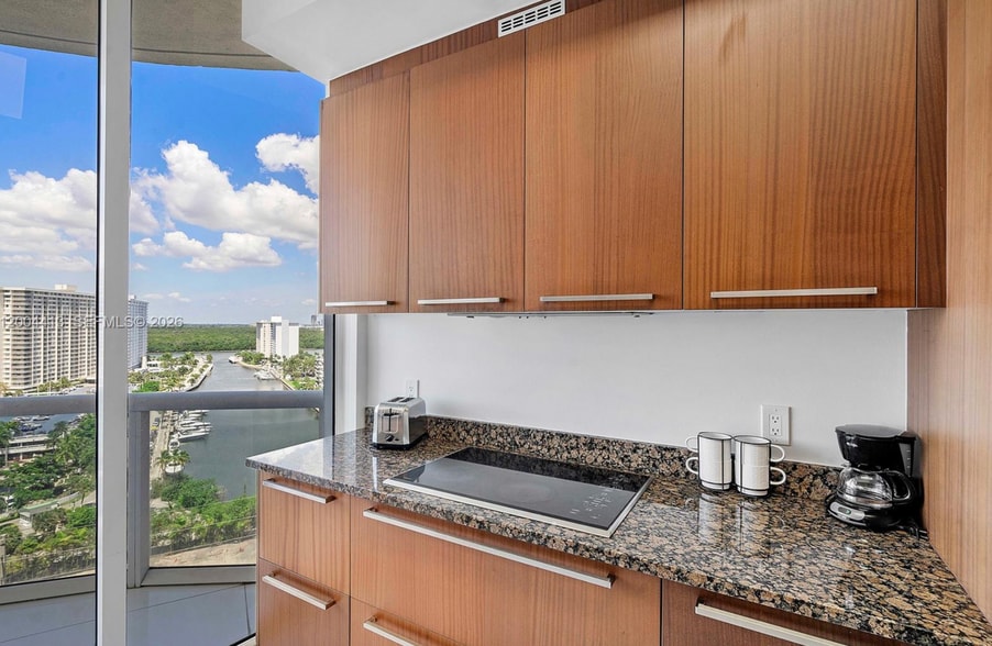 Building Photo - 15811 Collins Ave