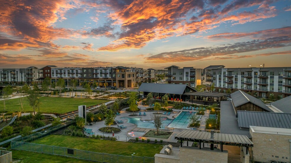 A sunset over The Brick and Mortar District Apartments - The Brick and Mortar District Apartments