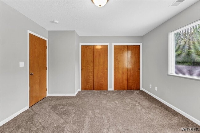 Building Photo - 6630 Erie Rd