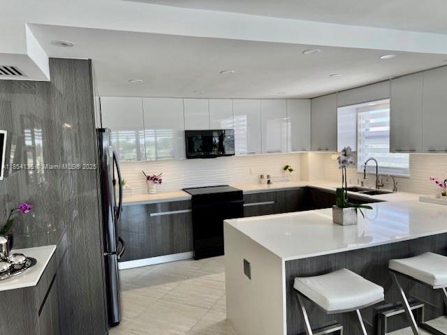 Building Photo - 9250 W Bay Harbor Dr