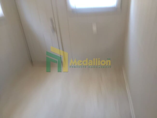 Building Photo - Spacious 5-Bedroom Brick Bungalow with Updated Interior