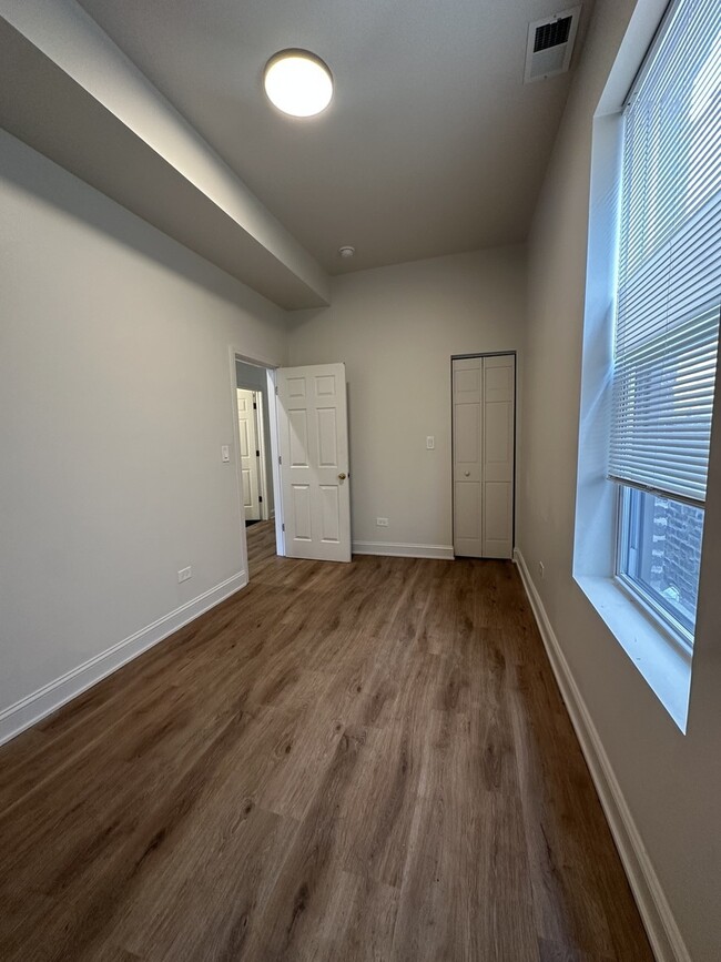 Building Photo - 6613 S Vernon Ave