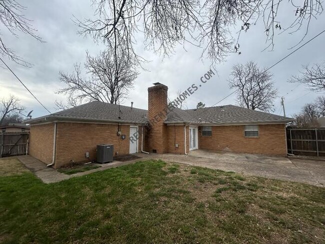 Building Photo - 9406 E 37th Ct