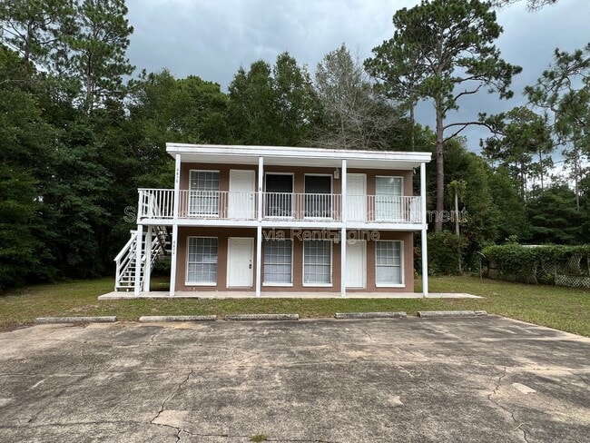 Building Photo - 6876 Trading Post Ln