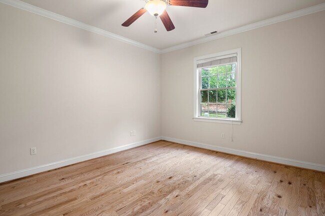 Building Photo - Five-Bedroom Tudor Home with Main-Level Primary Suite in Albemarle Reserve