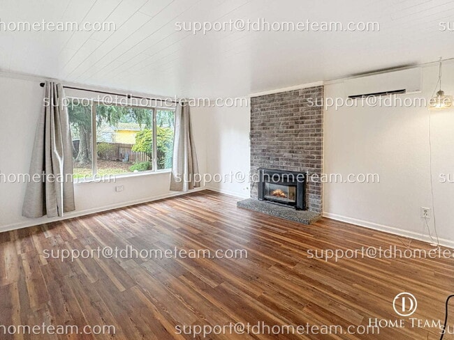 Building Photo - "Charming 3-Bed Bothell Home with Granite Touches, Cozy Fireplace, and Gleaming Hardwood Floors!"