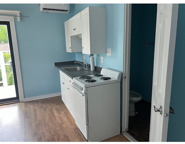 Building Photo - Studio with Private Balcony Available Now!