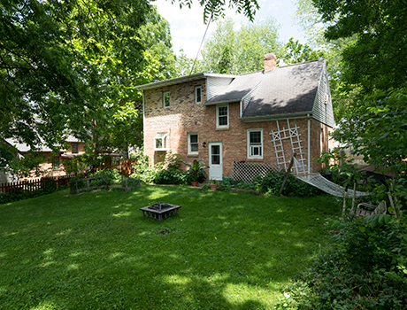 BAck of House Fenced in Backyard - 522 N Blackhawk Ave