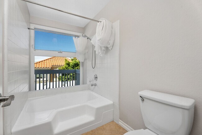 Building Photo - Coastal Elegance Meets Family Comfort in D...