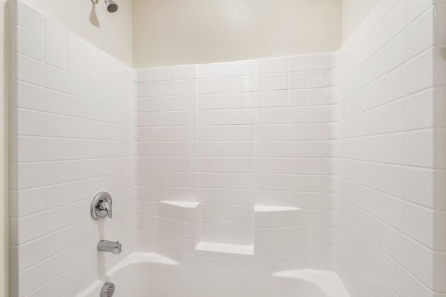 Building Photo - Modern West Henderson Townhome with Sleek Upgrades & Smart Home Features!