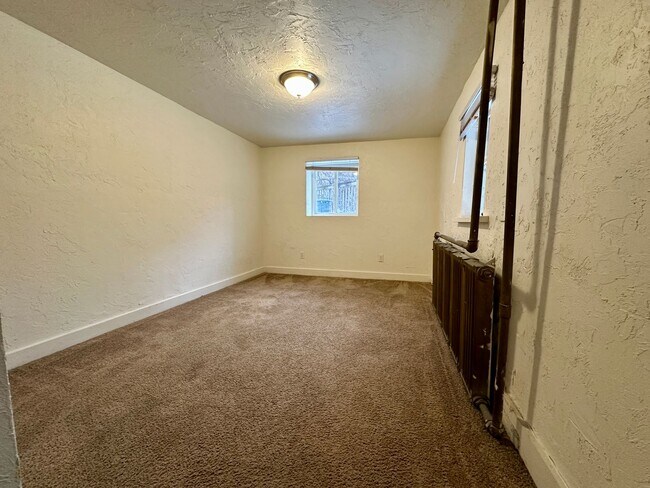 Building Photo - Super Spacious Three Bedroom on Bates Street! Deck & Patio! Washer & Dryer Included! Call Today!