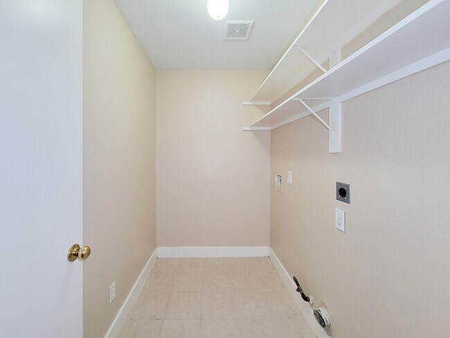 Building Photo - 3 bedroom one story home on large corner lot. Home has hard flooring throughout living areas and ...