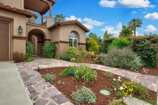 Building Photo - Gated corner lot home walking distance to the beach