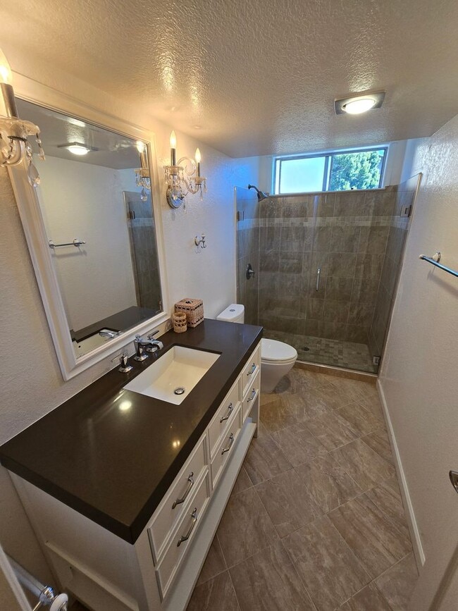 Building Photo - Tri Level Townhouse located in a Gated Com...