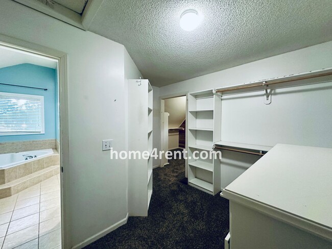 Building Photo - Blue Valley Schools w/ Wood Floors, Finished Basement and a Peaceful, Private Fenced Yard!