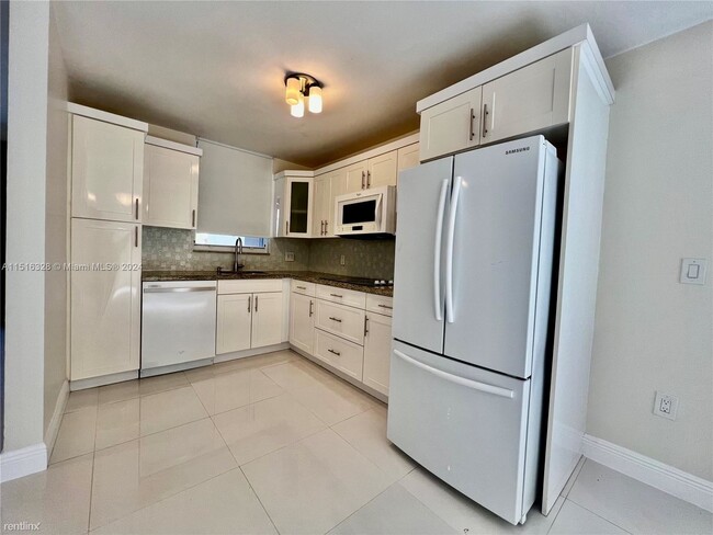 Building Photo - 3 br, 2.5 bath Condo - 8625 SW 152nd Ave A...