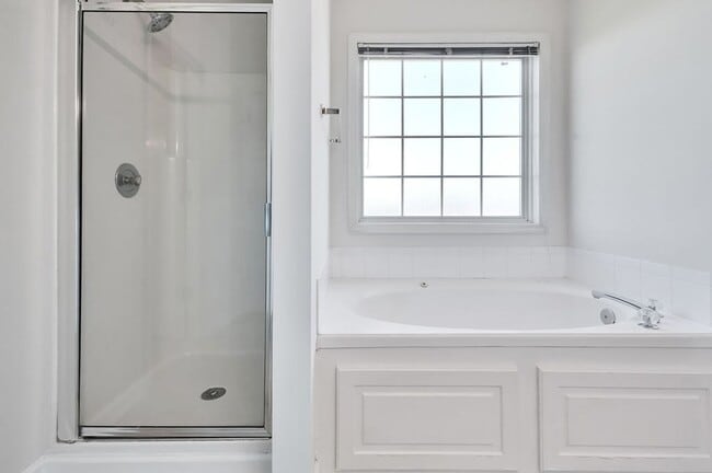 Building Photo - RENT SPECIAL! Freshly Painted! New Luxury ...