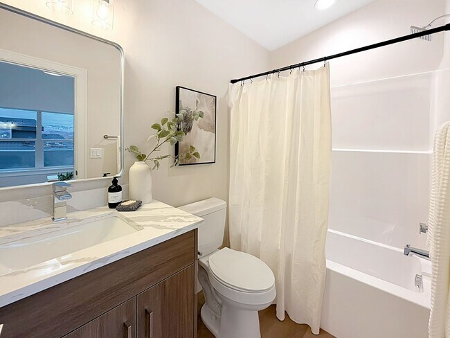 Building Photo - New Construction 4-Bedroom Residence in Garden City — 2 Primary Suites, Pet-Friendly, EV Charger ...