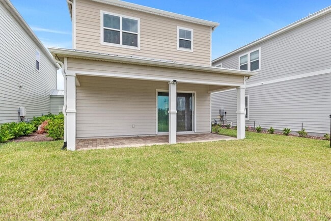 Building Photo - 3 Bedroom, 2.5 Bath Townhome in BEACHWALK ...