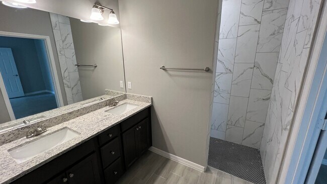 Building Photo - Smart & Stylish 3BD/2BA Palm Bay Home – Modern Upgrades, No Water Bills!