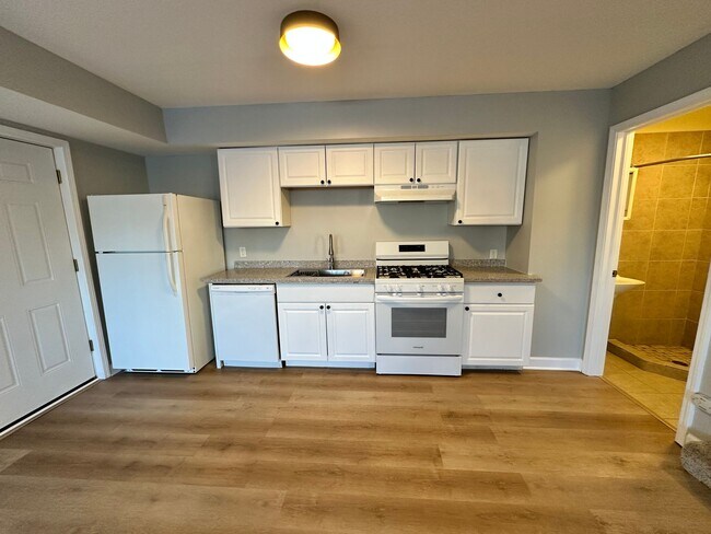 Building Photo - *$1,000 OFF Monthly Rent Through Summer!* Renovated 5-BR, 2-BA