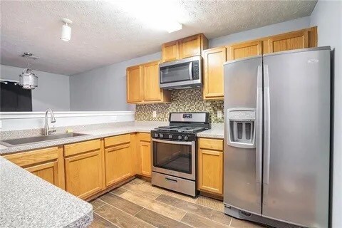 Building Photo - 5563 Windfall Ln
