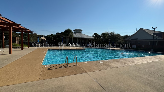 Building Photo - 4BR/3BA Well appointed home in the gated c...