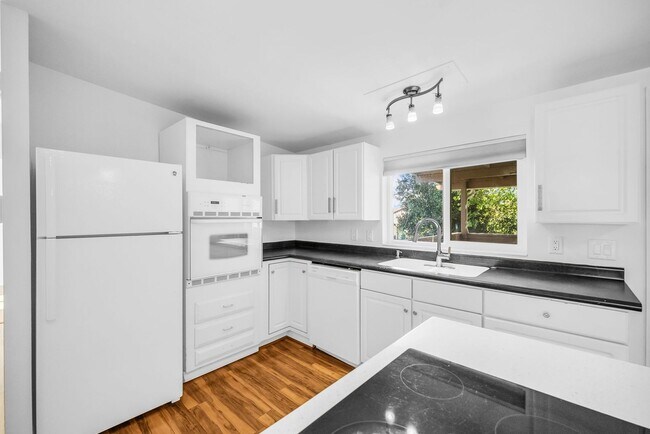 Building Photo - Spacious 4-Bedroom Layton Home with Finished Basement and 2-Car Garage