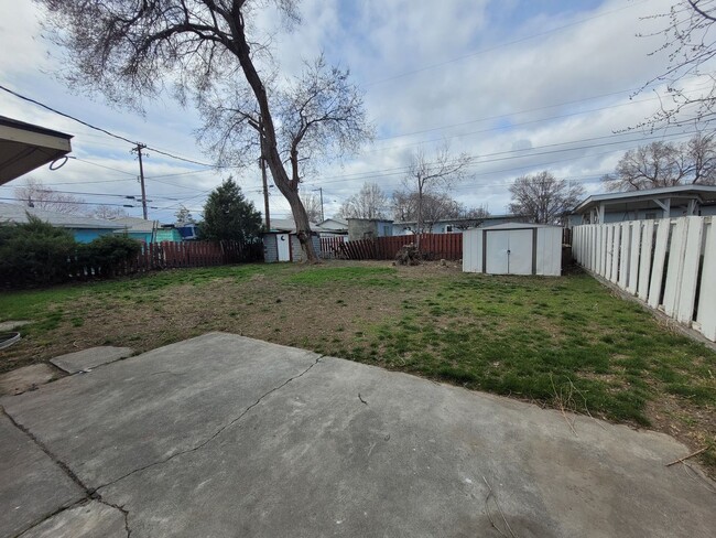 Building Photo - House with Fenced Backyard