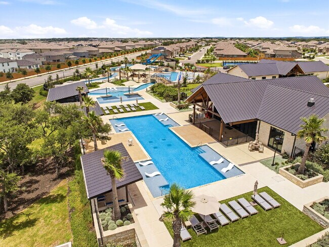 Building Photo - RESORT STYLE AMENITIES!! Multiple Pools. Lazy River. Splash Pad and Water Slides. Fitness Center....