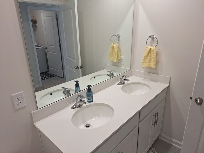 Building Photo - Lovely Four Bedroom Home  Appropriately 5 ...