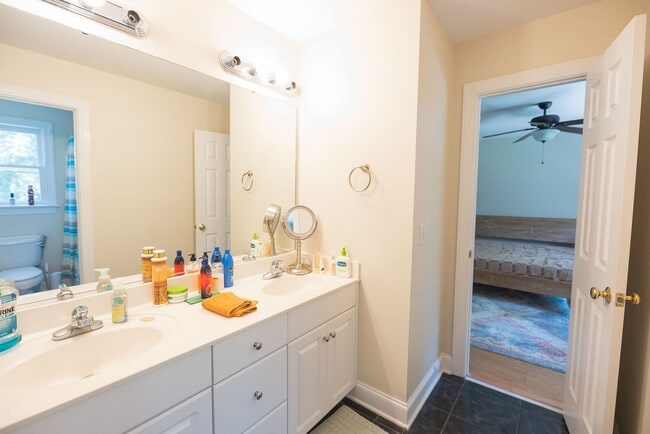 Building Photo - Spacious & Striking 3-story brick Executive 4 bedroom 4.5 bathroom home in Oak Ridge NC + Lawn ca...