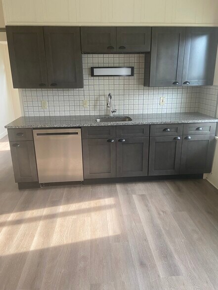 Kitchen with new cabinets and granite countertops - 71 Gough Ave