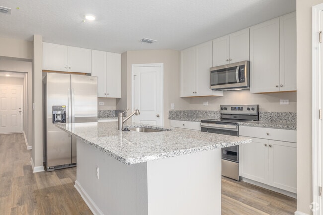 2BR, 2.5BA - 1,638SF - Kitchen - Waterside Townhomes at River City