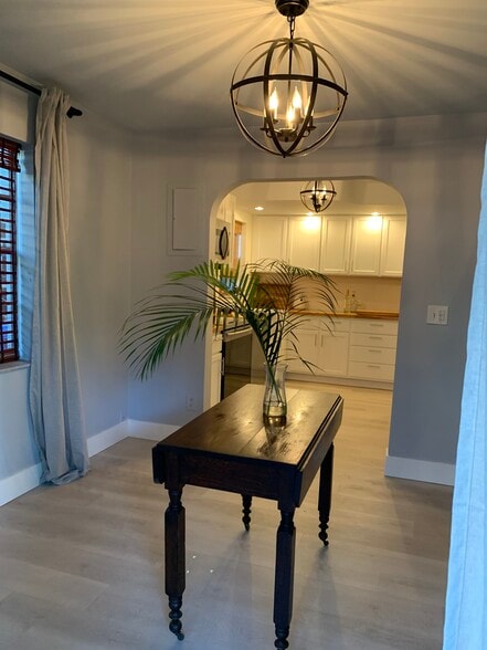 View into kitchen from dining room - 1202 N Andrews Ave