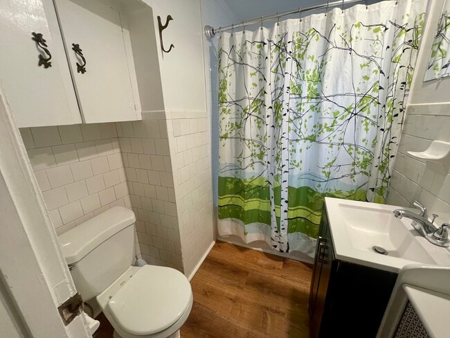 Bathroom with bathtub and shower - 6027 Ridge Dr