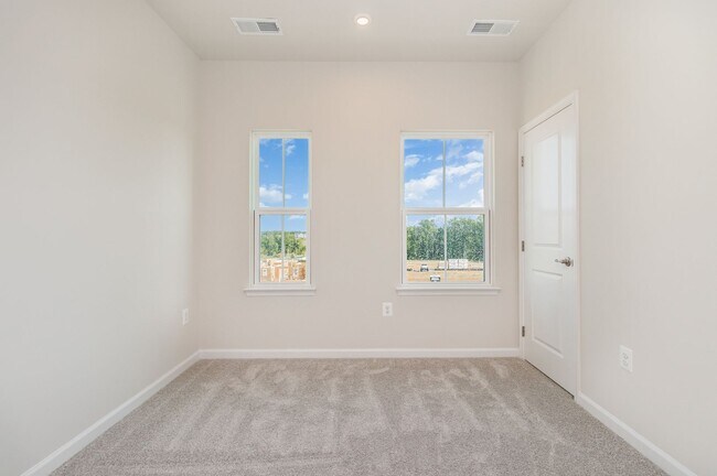 Building Photo - New Construction 3 Bedroom Townhome in Fre...