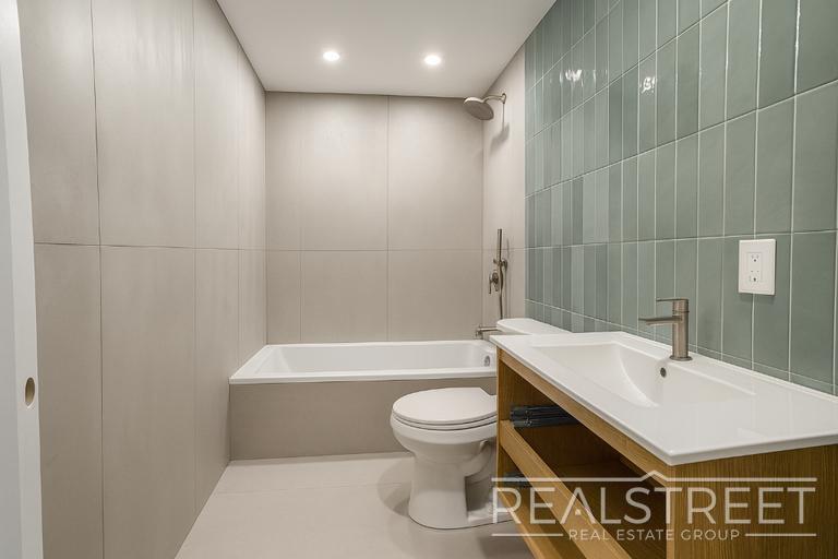 Building Photo - Spacious 2-Bedroom, 2-Bath Apartment in Bed-Stuy with Modern Amenities