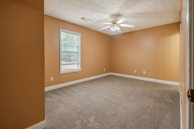 Building Photo - Spacious 4BR/3BA Townhome | Pet Friendly | Washer & Dryer Included | $1,600/mo