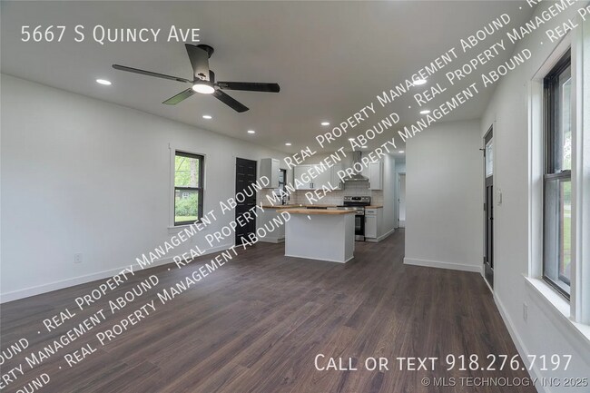 Building Photo - 5667 S Quincy Ave