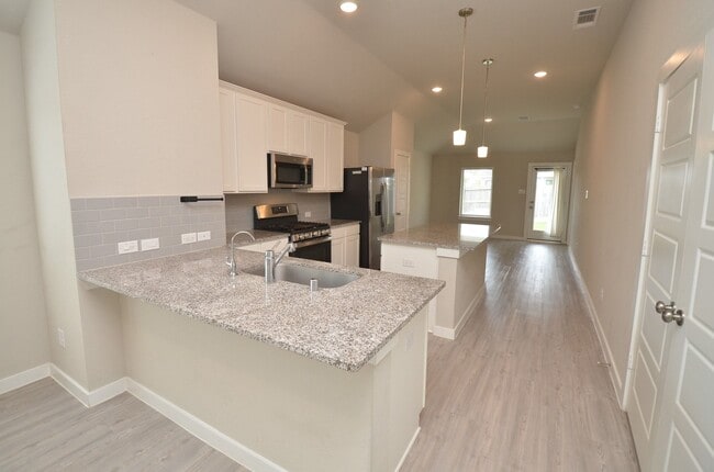 Building Photo - 8230 Blue Fish Dr