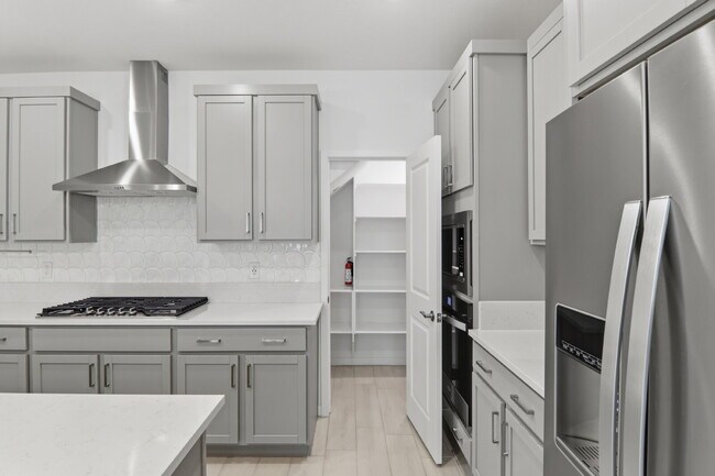 Building Photo - Experience refined living in this beautifully appointed 3-bedroom, 2.5-bathroom townhome spanning...