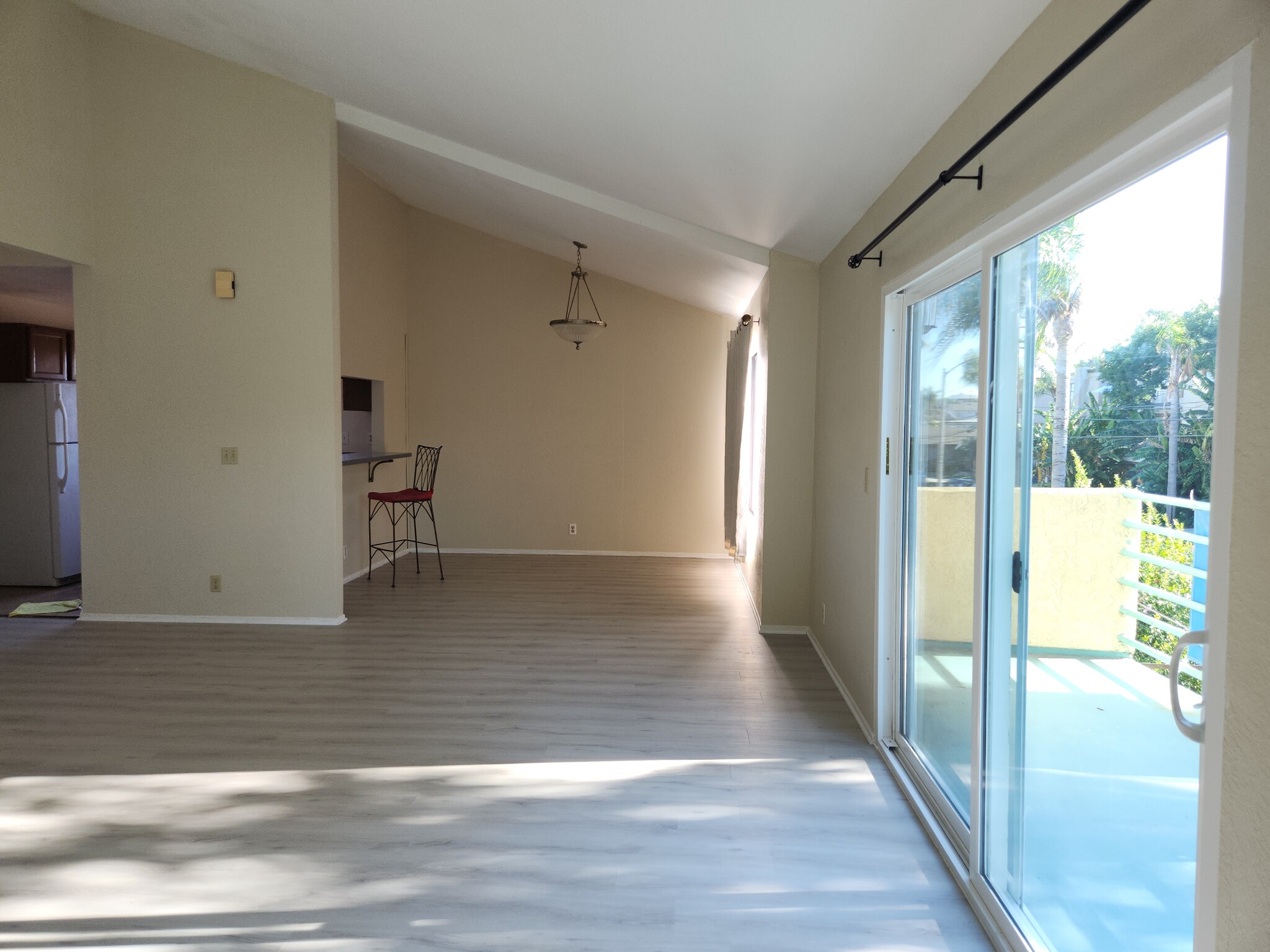 Living Room with view of Dining Room and Balcony - 1208 Roswell Ave