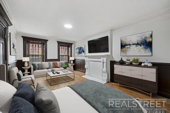 Building Photo - Timelessly Renovated Historic Triplex with...