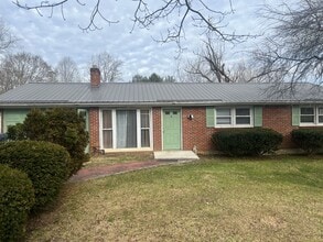 Building Photo - ONE LEVEL BRICK RANCHER WITH EXTRA LARGE LOT