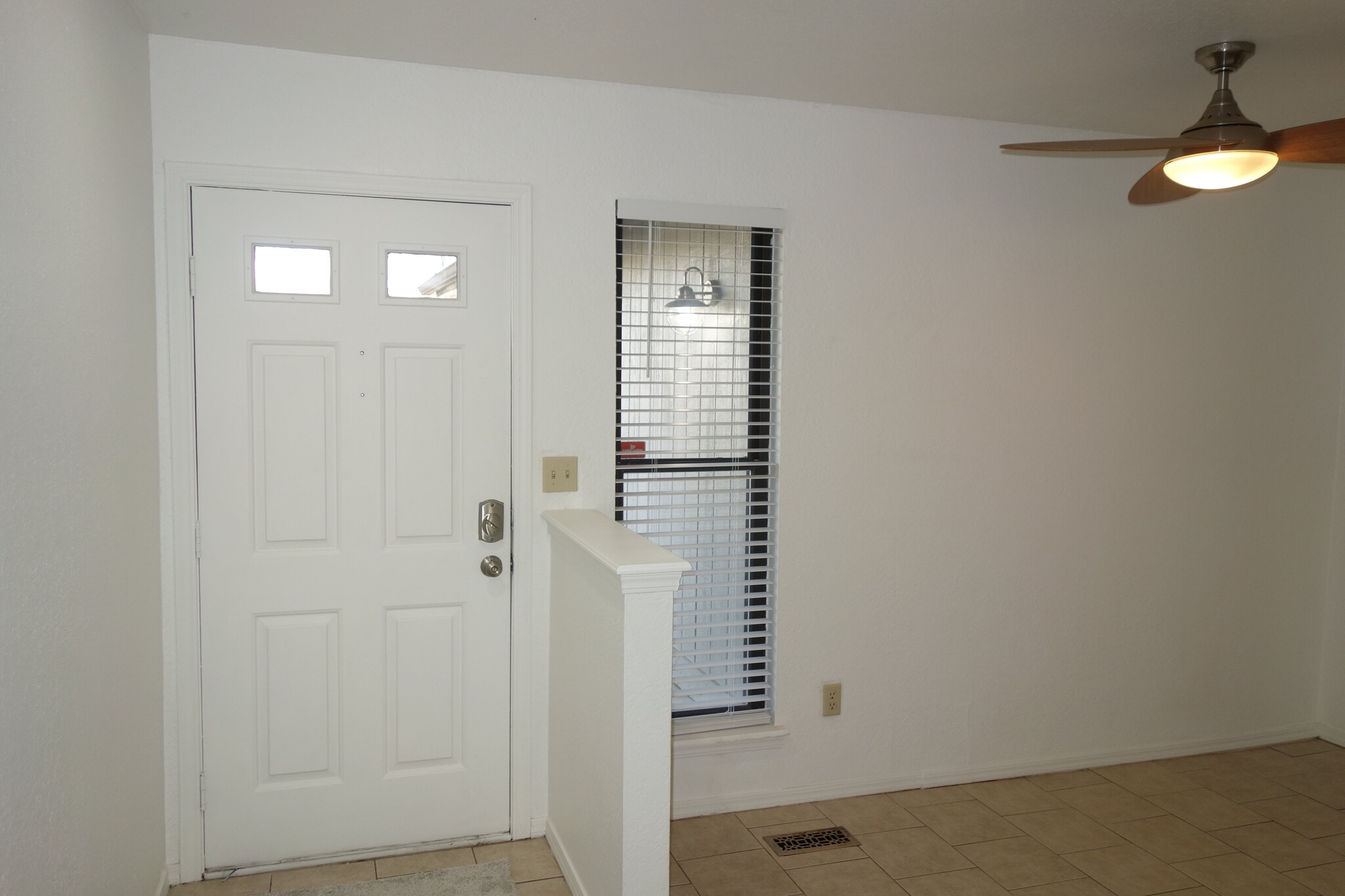 Inside the front door w/ dining area on right - 6604 S Utica Pl