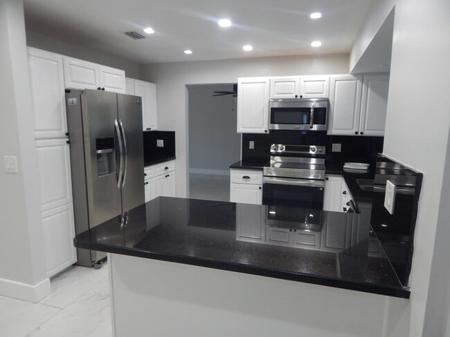 Building Photo - 8301 Wilton Dr