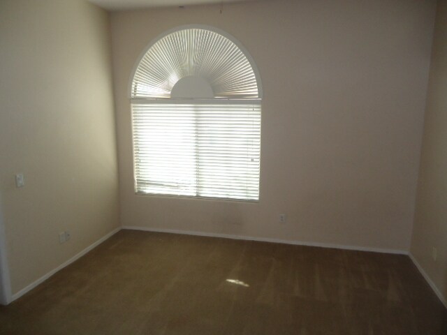 Building Photo - Great 4/3 house for rent in gated communit...